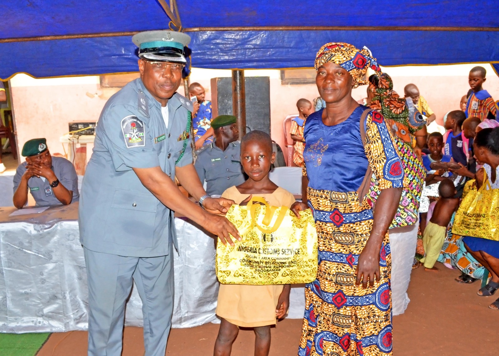 OGUN CUSTOMS SUPPORTS PRIMARY EDUCATION PUPILS WITH SET OF UNIFORMS, WRITING MATERIALS